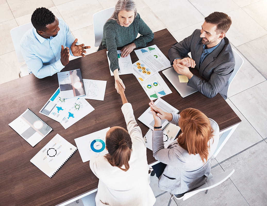 Group of people having a meeting at the desk